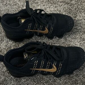 Nike Black and Gold Athletic Shoes